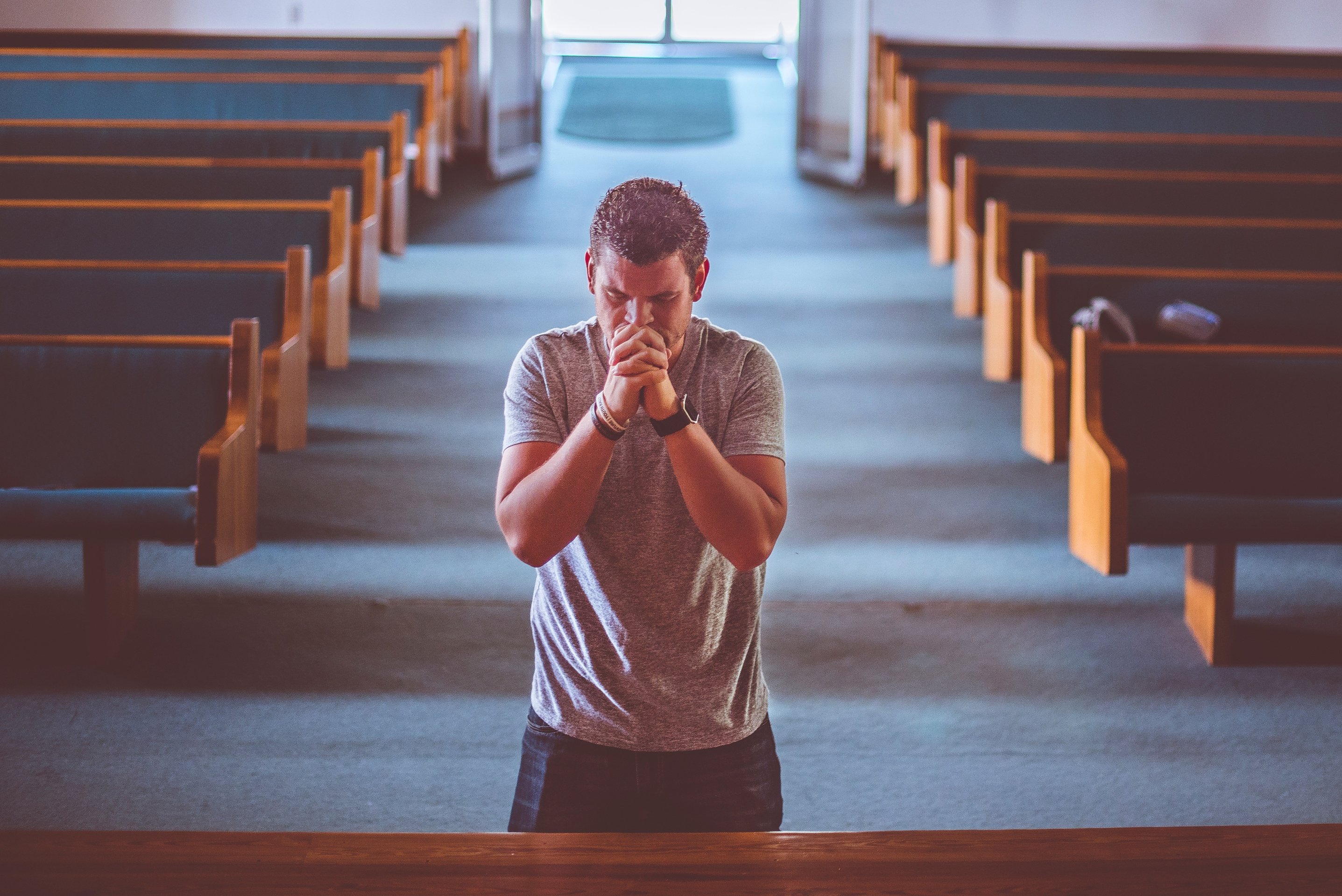 Man Praying in the Church