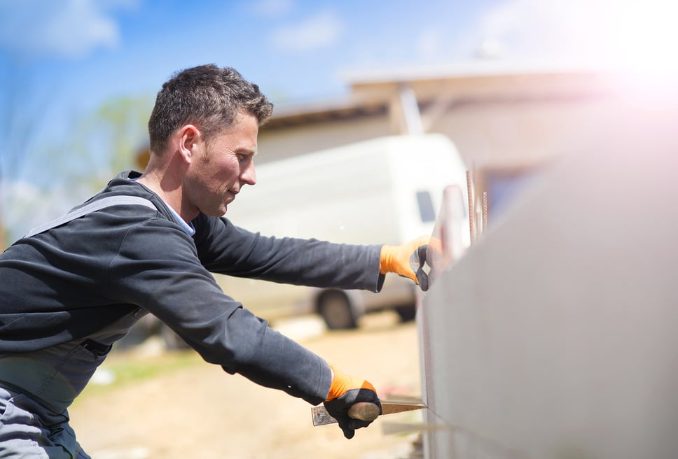 Man Building a House